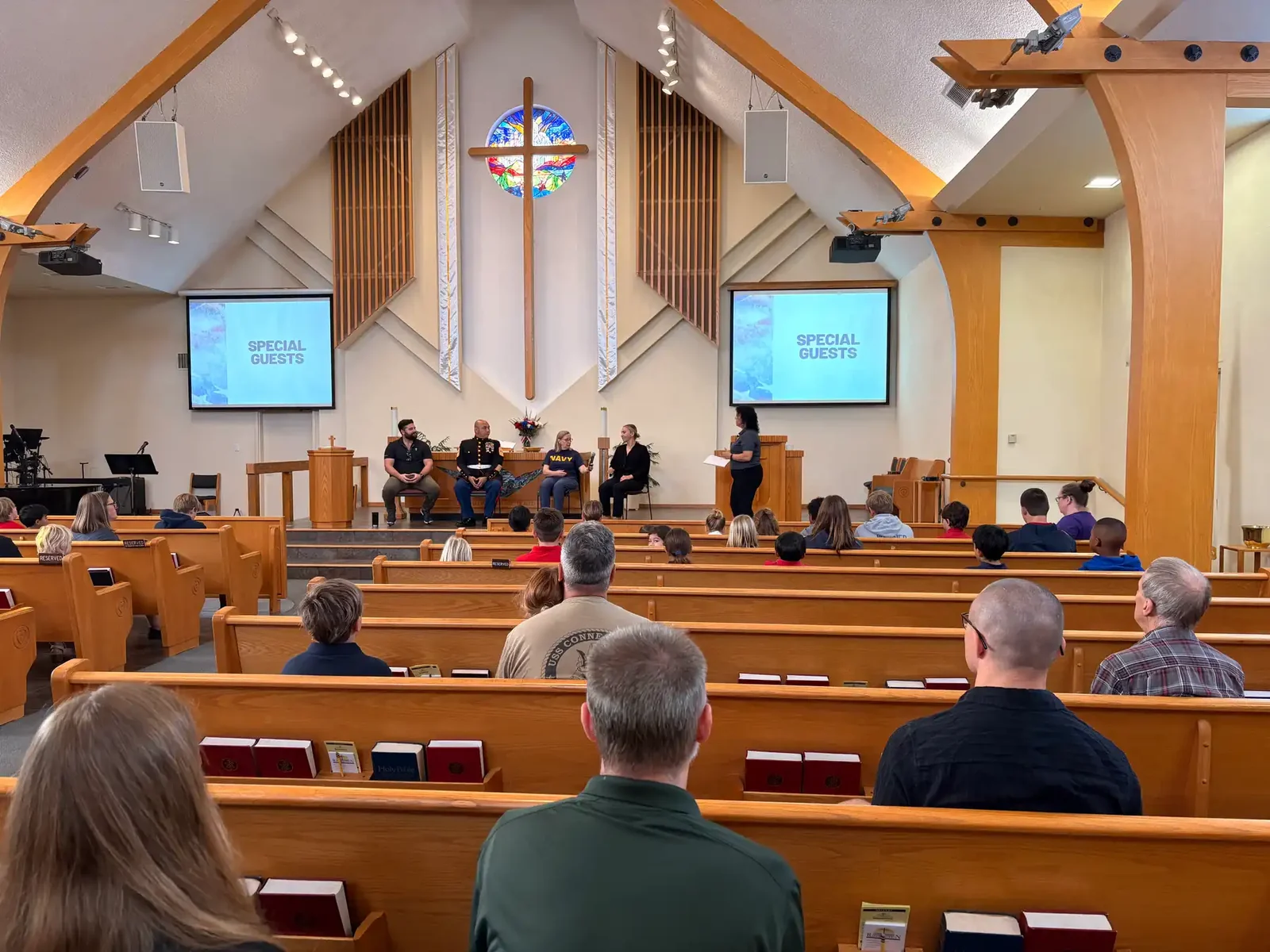 A worship service in the sanctuary of Reformation Lutheran Church, which shares the campus with the school